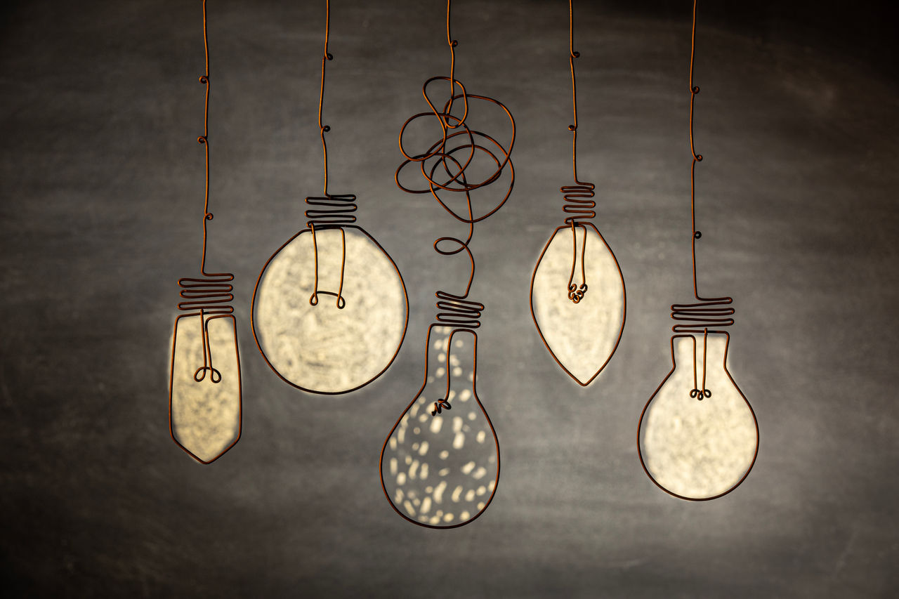 wire art hanging lightbulbs