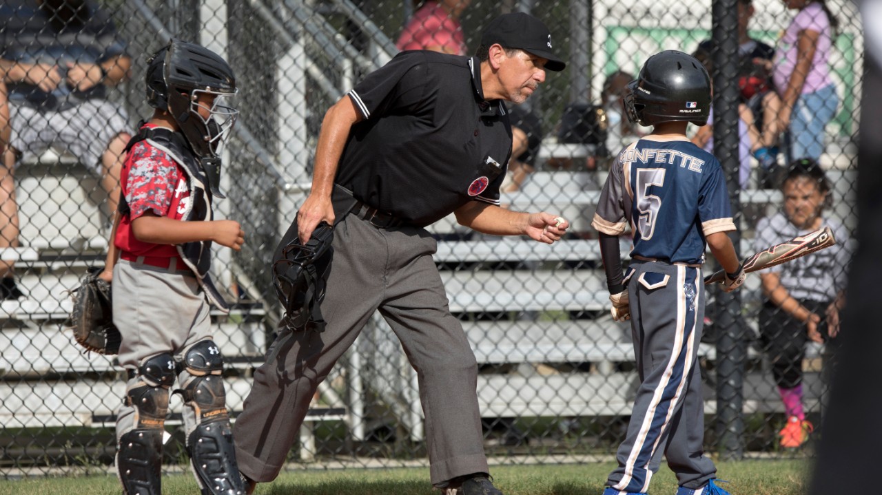 Nick DeCola umpire, working at little league game